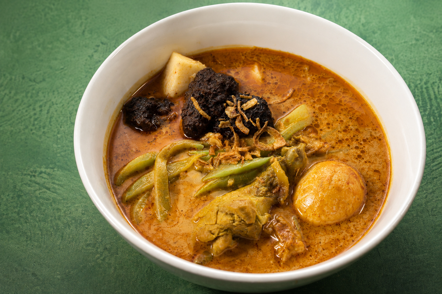 IBU: Chicken and egg curry bowl — Indonesian restaurant food photography